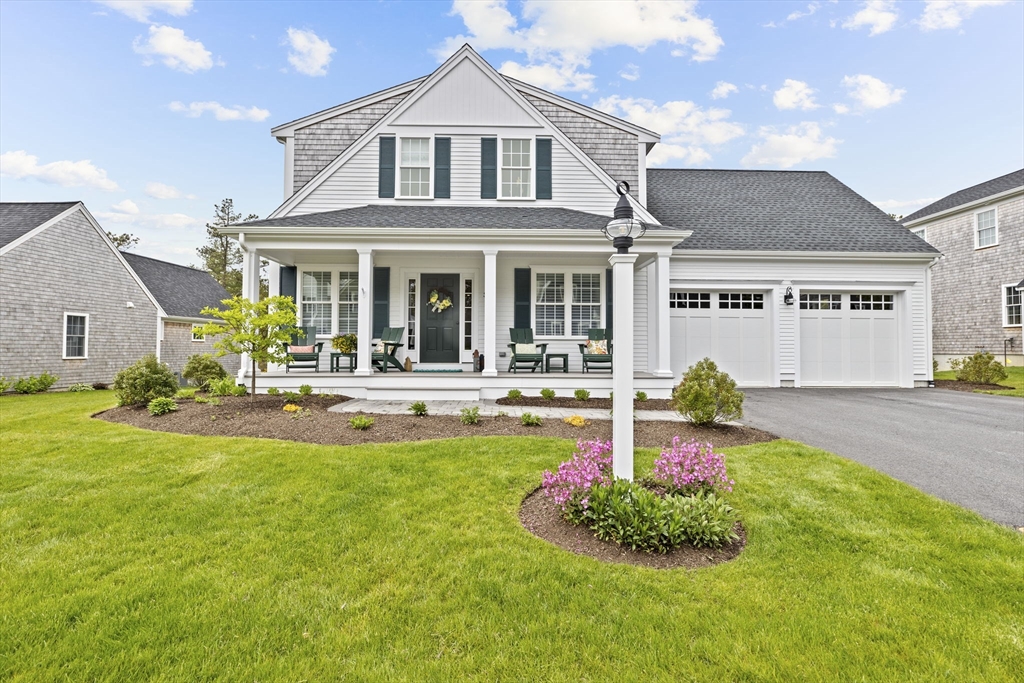 31 Farm Road Plymouth, MA 02360 - Photo 1 of 37 a front view of a house with yard and green space