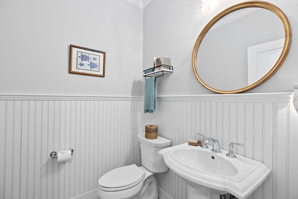 31 Farm Road Plymouth, MA 02360 - Photo 20 of 37 a bathroom with a sink a mirror and a toilet