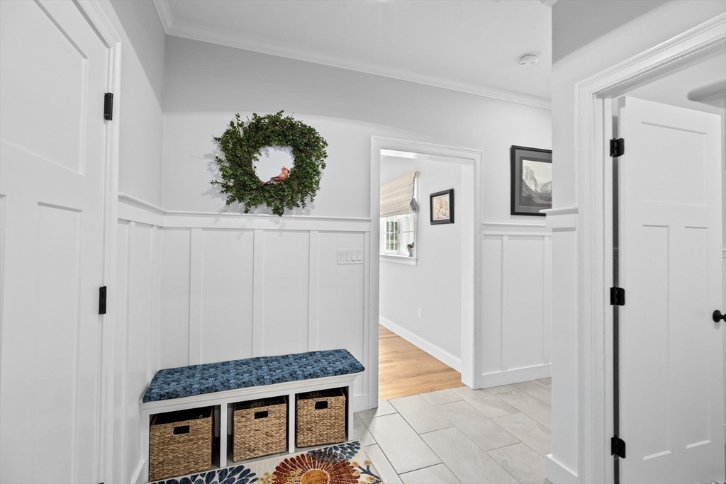 31 Farm Road Plymouth, MA 02360 - Photo 21 of 37 a living room with furniture and a potted plant