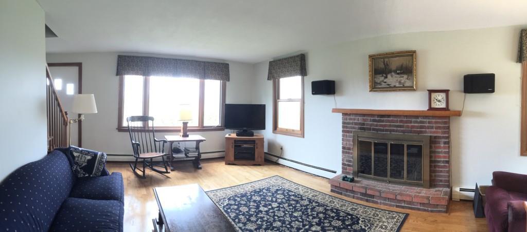 395 Crockett Ridge Road Norway, ME 04268 - Photo 21 of 24 A wide angle view of the living room.