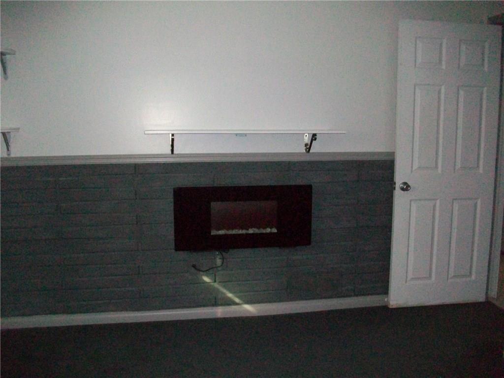4162 Sardis Road Pittsburgh, PA 15239 - Photo 6 of 13 Master with a electric firsplace