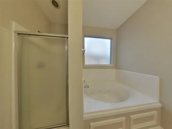 a bathroom with a bathtub