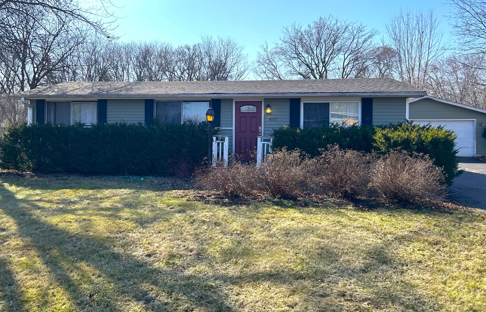 3611 Fillmore Road Johnsburg, IL 60051 - Photo 2 of 10 a view of a house with a yard and plants