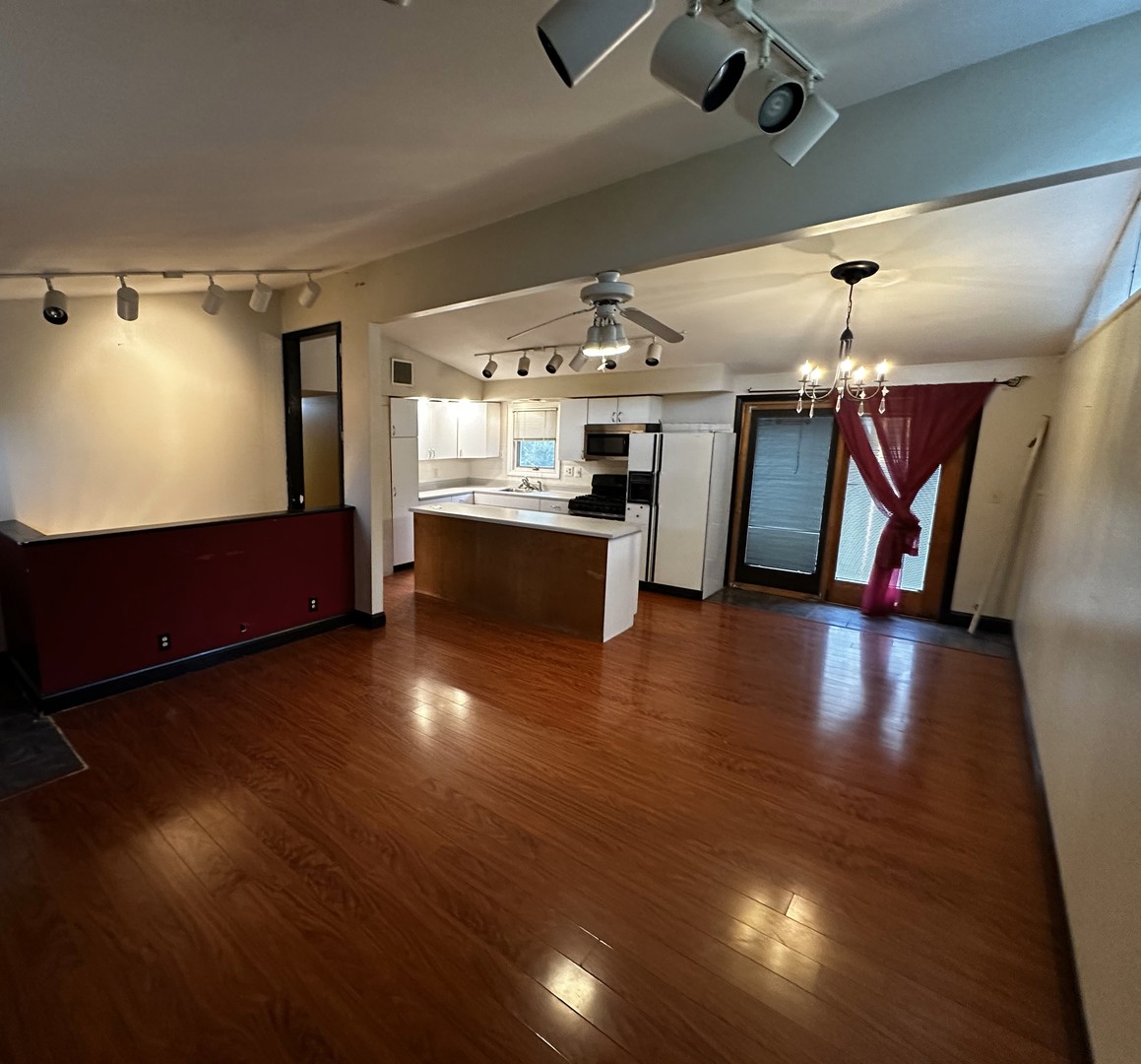 3611 Fillmore Road Johnsburg, IL 60051 - Photo 4 of 10 a view of kitchen and hall with wooden floor