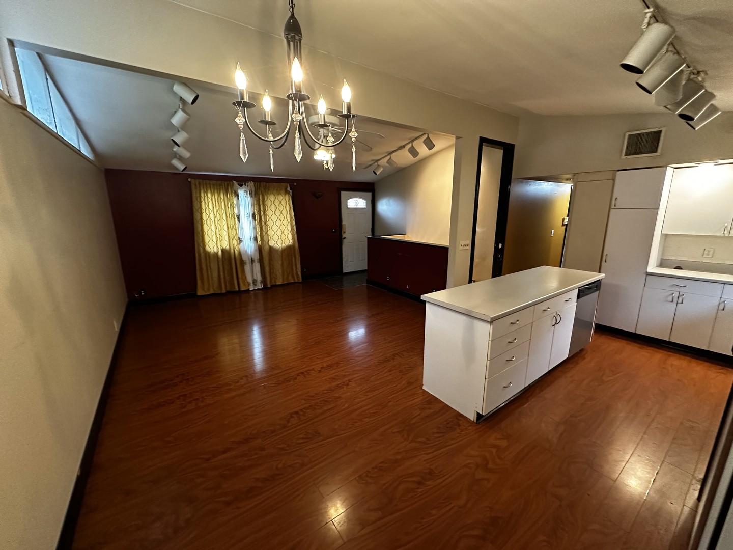 3611 Fillmore Road Johnsburg, IL 60051 - Photo 6 of 10 a view of a livingroom with kitchen and furniture