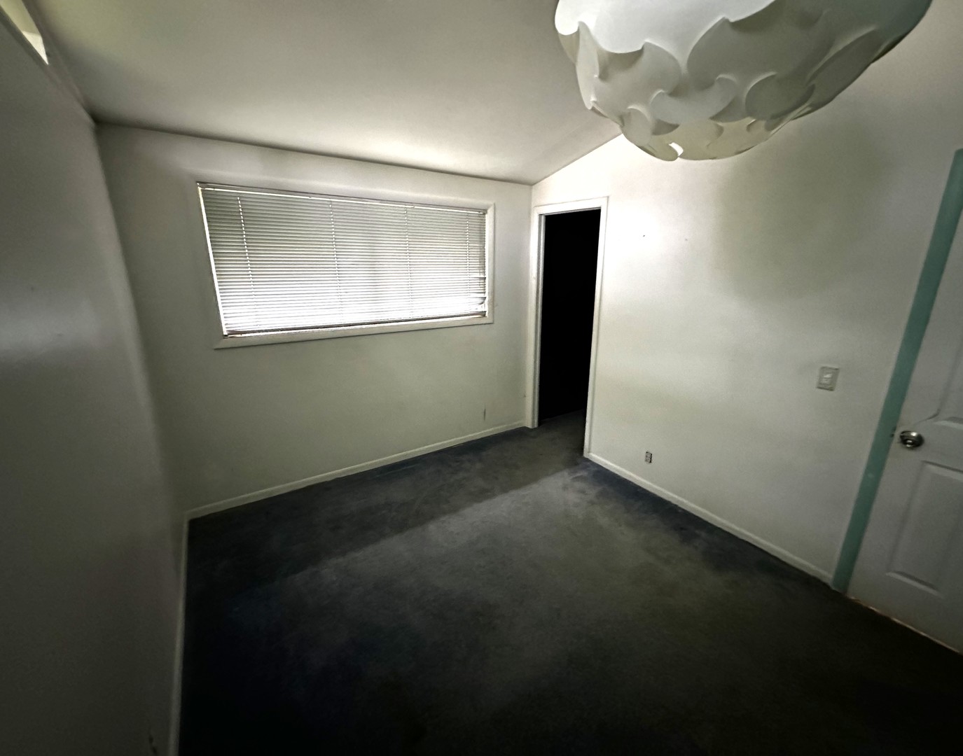 3611 Fillmore Road Johnsburg, IL 60051 - Photo 8 of 10 a view of an empty room with wooden floor and a window