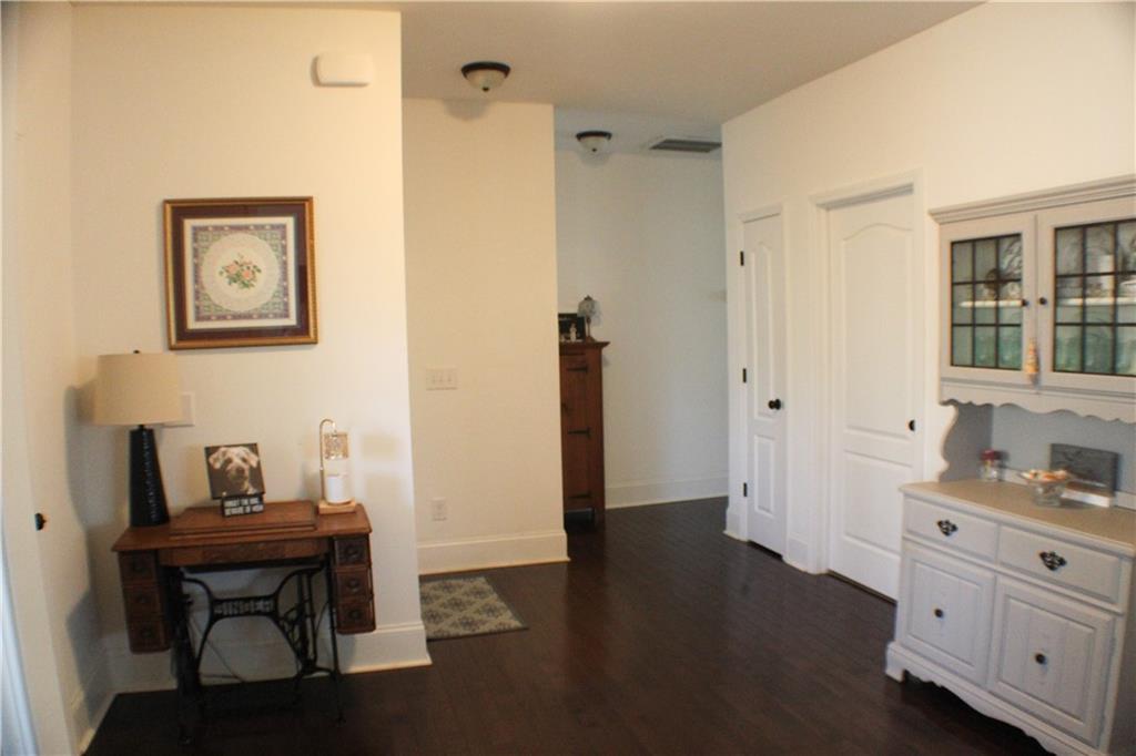 1175 Diamond Hill Colbert Road Colbert, GA 30628 - Photo 13 of 27 a view of room with window and wooden floor
