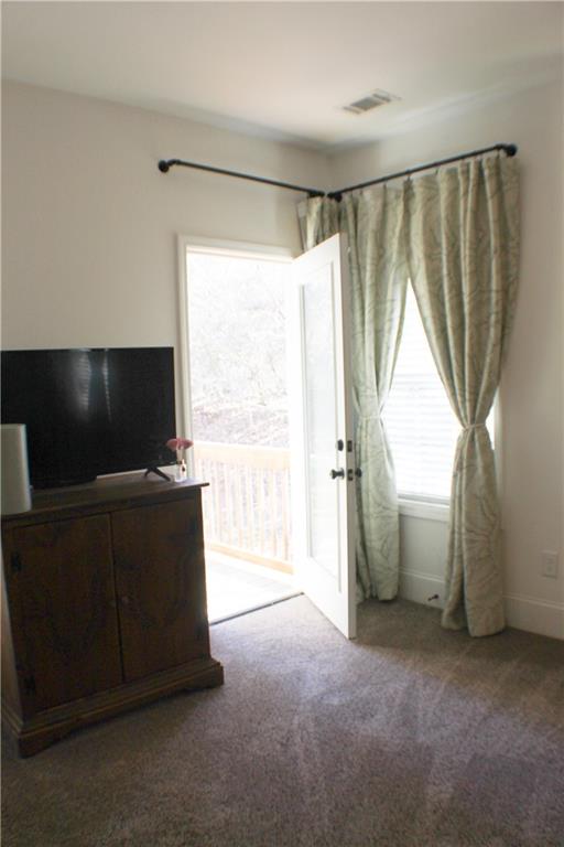 1175 Diamond Hill Colbert Road Colbert, GA 30628 - Photo 17 of 27 a living room with furniture and a flat screen tv