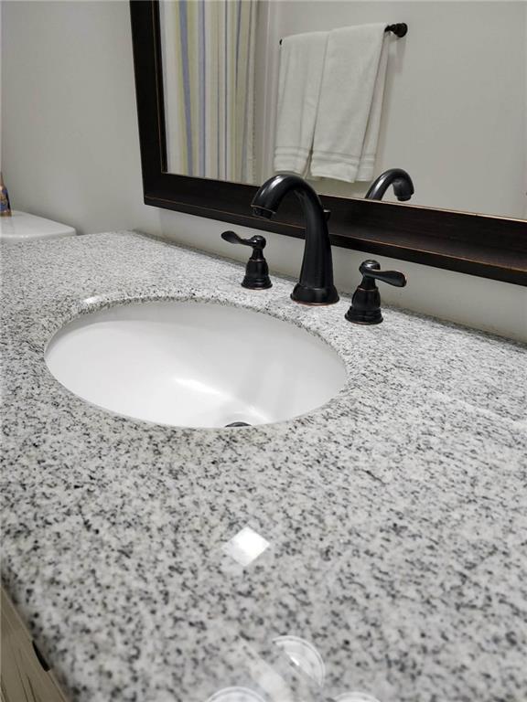 1175 Diamond Hill Colbert Road Colbert, GA 30628 - Photo 20 of 45 a bathroom with a sink and a mirror