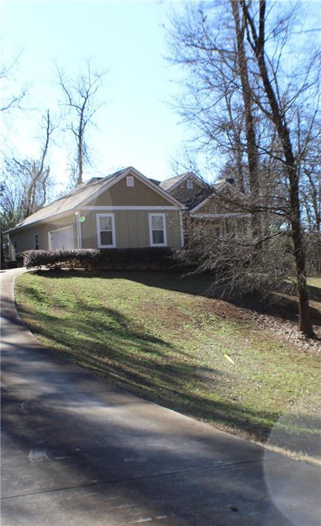 1175 Diamond Hill Colbert Road Colbert, GA 30628 - Photo 3 of 27 a front view of a house with a yard