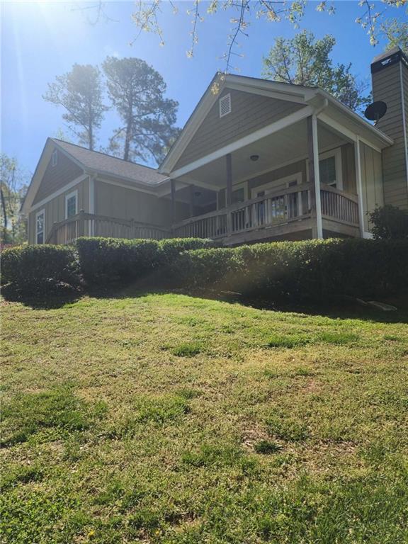 1175 Diamond Hill Colbert Road Colbert, GA 30628 - Photo 3 of 45 a front view of a house with a yard