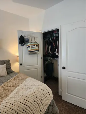 a view of storage and utility room with washer and dryer