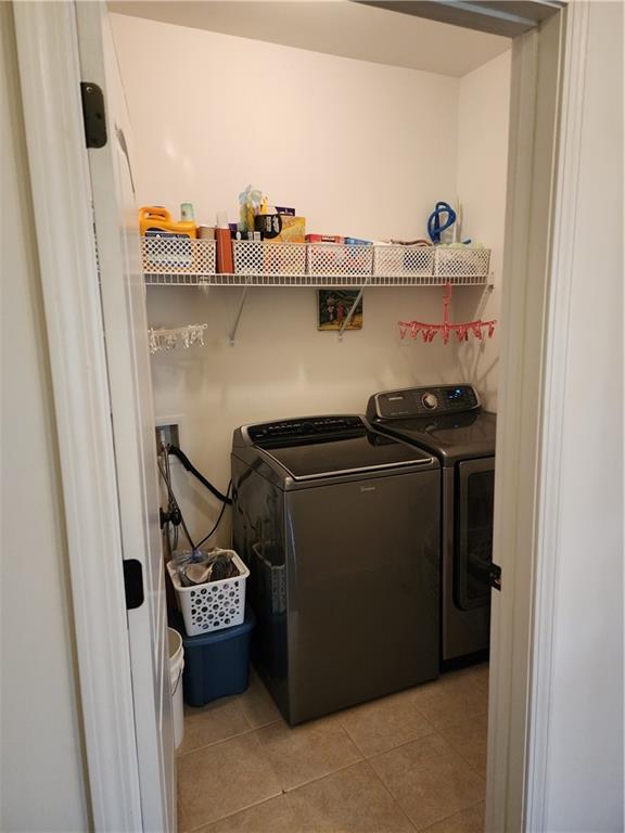 1175 Diamond Hill Colbert Road Colbert, GA 30628 - Photo 38 of 45 a view of storage and utility room with washer and dryer