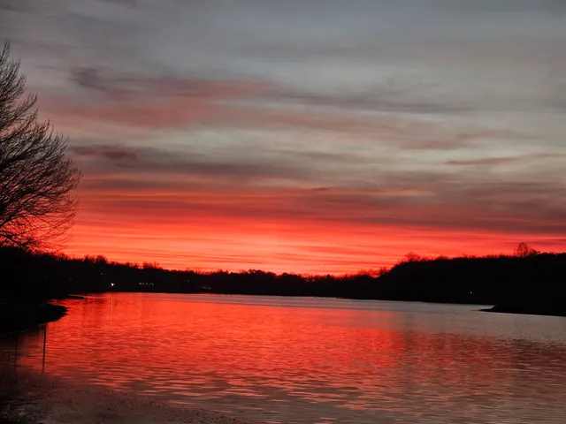 a view of ocean with sunset