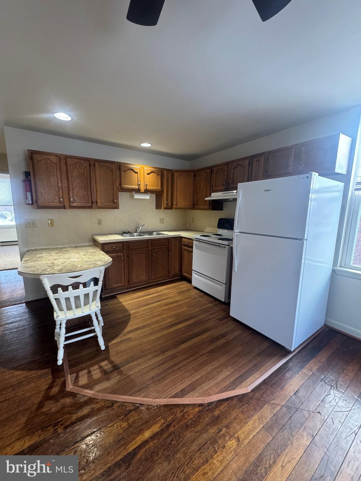 11 Michigan Avenue, Unit B Lancaster, PA 17602 - Photo 3 of 7 Cozy kitchen with warm wooden accents.