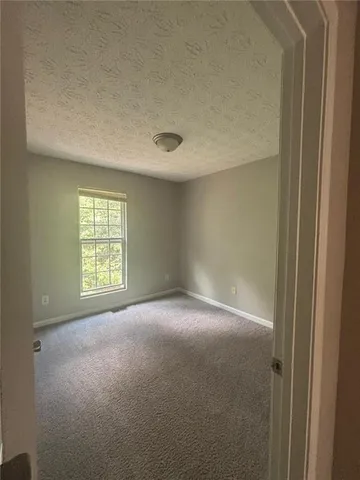 a view of empty room with window