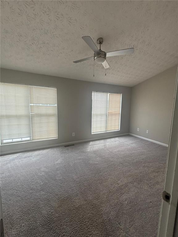 6242 Redan Overlook Lithonia, GA 30058 - Photo 5 of 17 an empty room with a empty space and windows