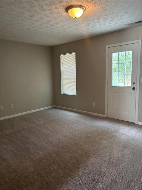 6242 Redan Overlook Lithonia, GA 30058 - Photo 7 of 17 an empty room with a window