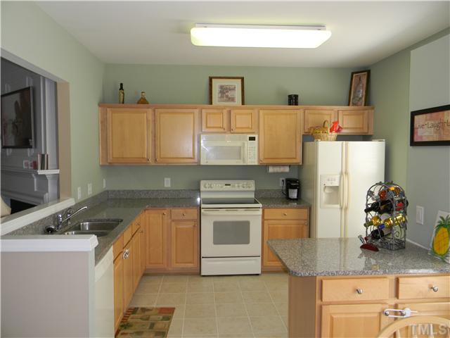 7222 Janston Drive Raleigh, NC 27613 - Photo 3 of 21 New Granite Counter Tops! Open and bright Kitchen