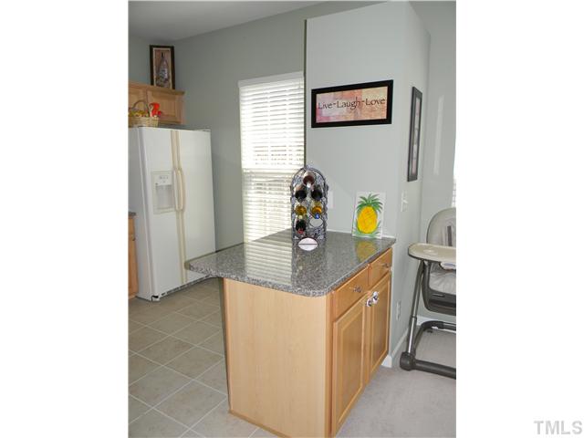 7222 Janston Drive Raleigh, NC 27613 - Photo 5 of 21 Great Breakfast nook for bar stools and storage underneath