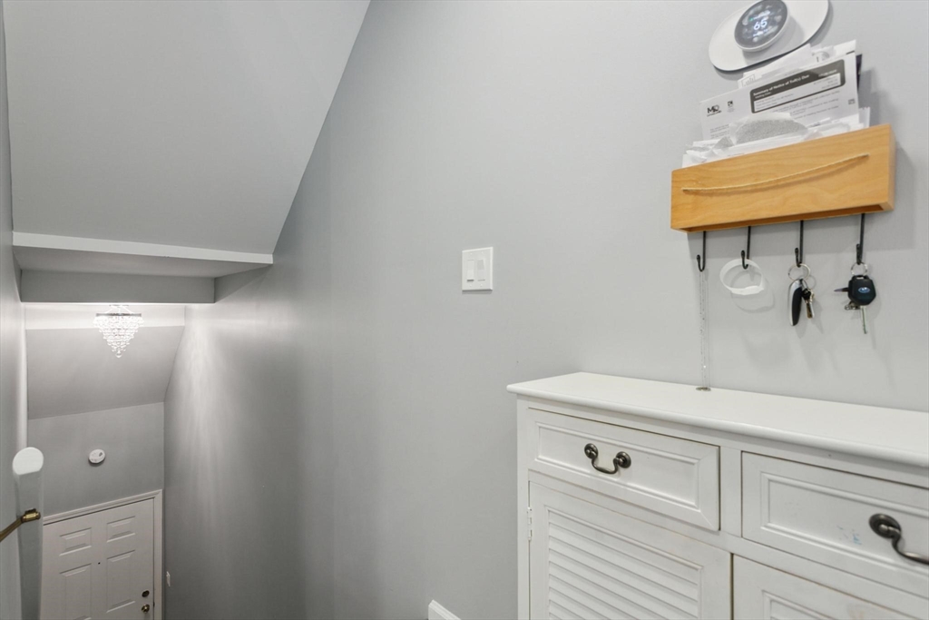 707 Gazebo Circle, Unit 707 Reading, MA 01867 - Photo 12 of 41 a bathroom with a sink and vanity