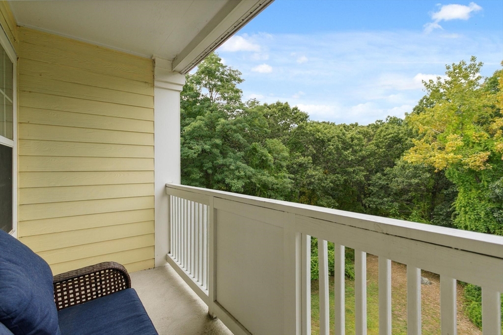 707 Gazebo Circle, Unit 707 Reading, MA 01867 - Photo 23 of 41 a view of a balcony with chair