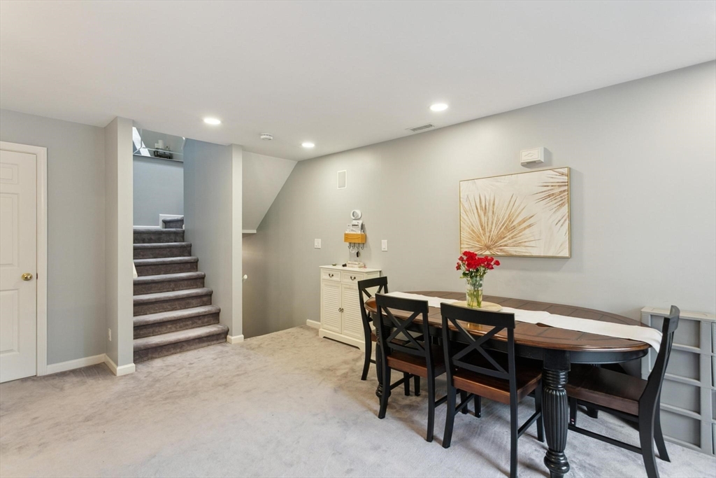 707 Gazebo Circle, Unit 707 Reading, MA 01867 - Photo 6 of 41 a view of a dining room with furniture