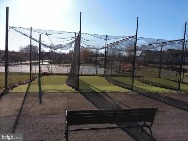 a sitting area with couch on the deck
