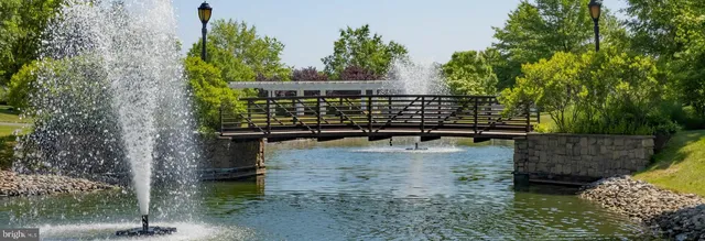 a view of swimming pool with a yard