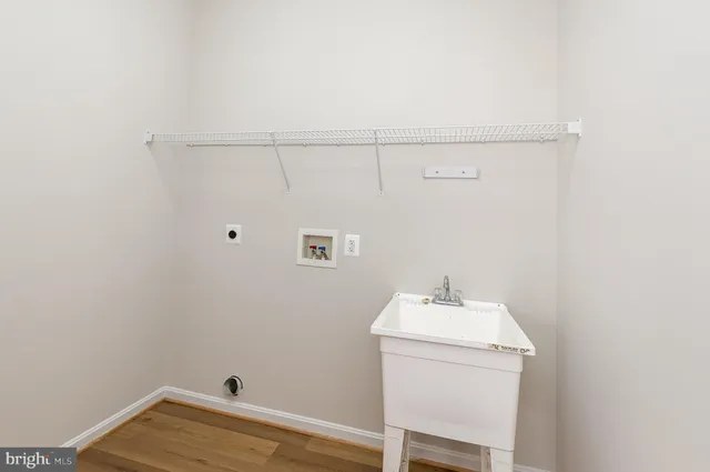 a bathroom with a sink and vanity