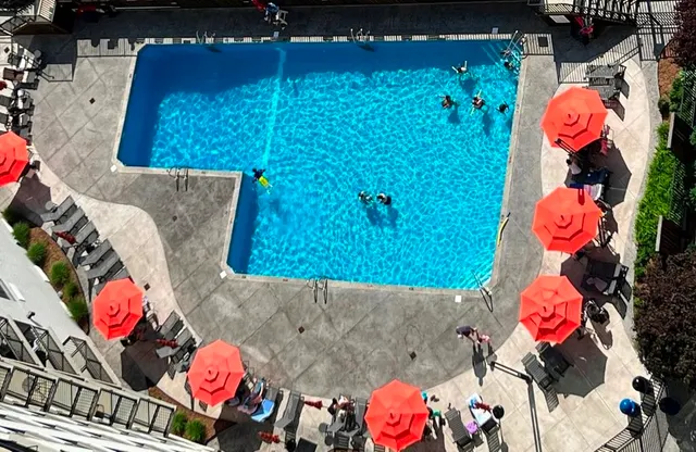 a kitchen with stainless steel appliances kitchen island granite countertop a sink and cabinets