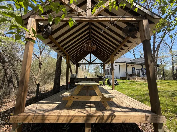 a view of yard with patio