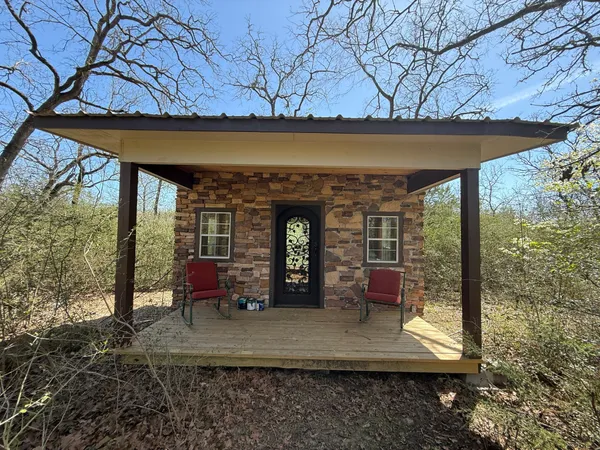 a room with furniture and a window