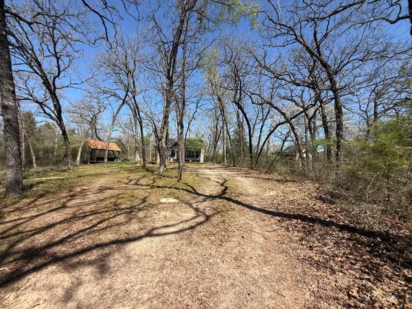 a view of swimming pool with a yard