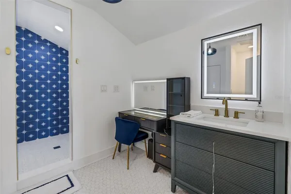 a view of room that has a bed and a window