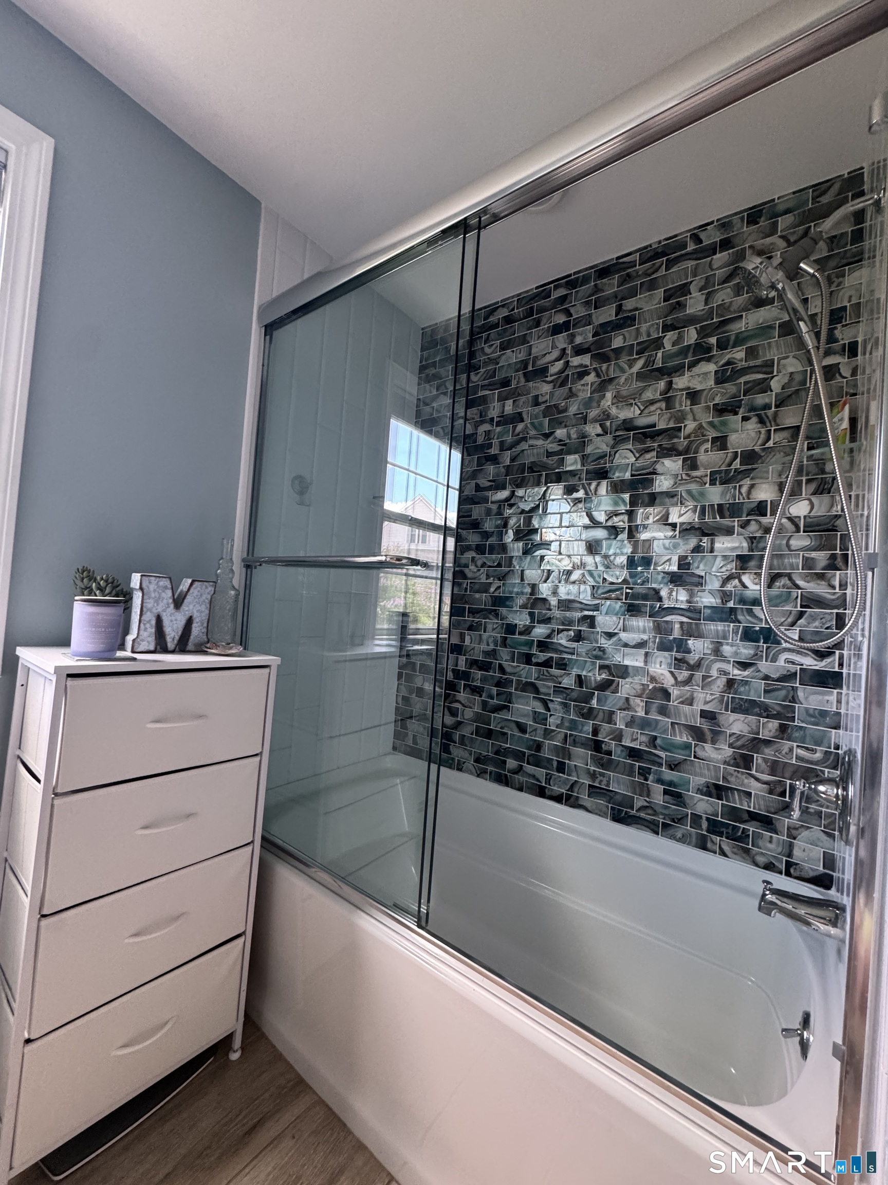 1514 Woodtick Road Wolcott, CT 06716 - Photo 15 of 23 a bathroom with a bathtub and a shower