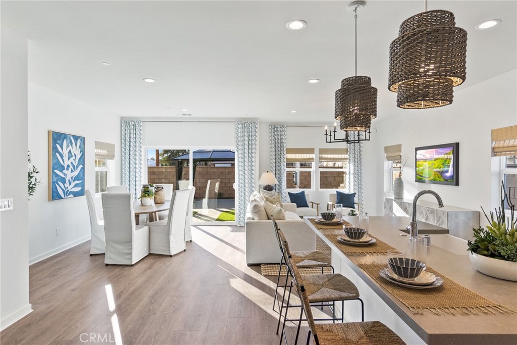 12352 Van Gogh Place Yucaipa, CA 92399 - Photo 22 of 44 a living room with furniture and wooden floor
