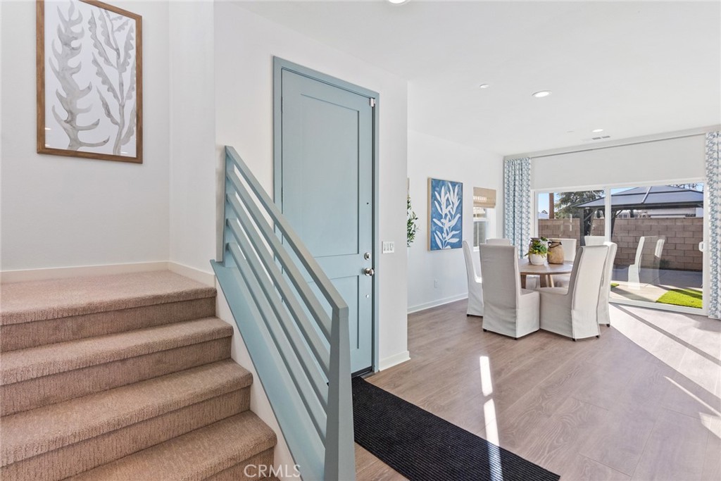 12352 Van Gogh Place Yucaipa, CA 92399 - Photo 29 of 44 a view of a hallway with workspace and stairs