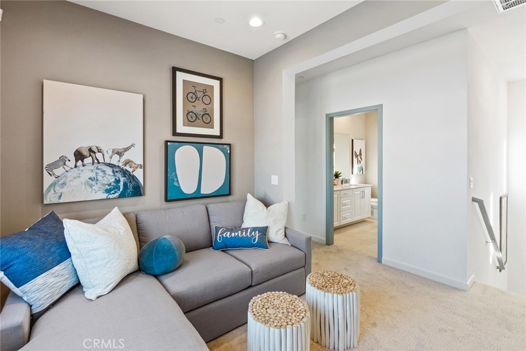 12352 Van Gogh Place Yucaipa, CA 92399 - Photo 31 of 44 a living room with furniture and a window