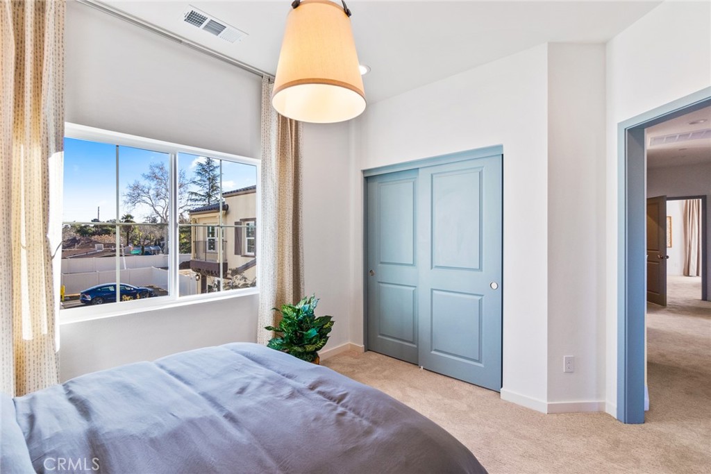 12352 Van Gogh Place Yucaipa, CA 92399 - Photo 34 of 44 a view of a bedroom and bathroom