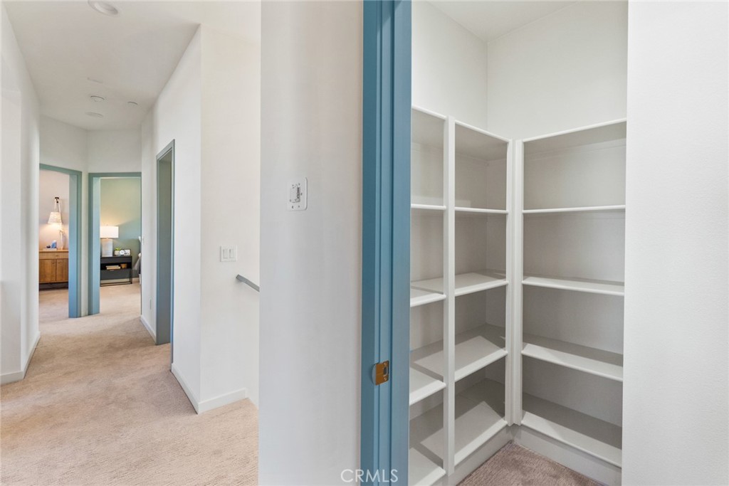12352 Van Gogh Place Yucaipa, CA 92399 - Photo 37 of 44 a view of a hallway with closet