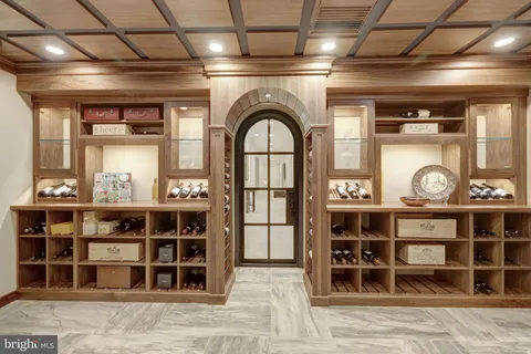 a view of a wooden door and a window