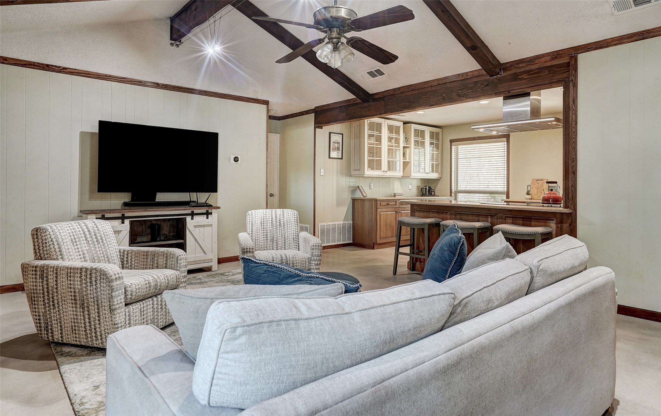 1105 North Riviera Circle Cedar Park, TX 78613 - Photo 12 of 32 a living room with furniture and a flat screen tv