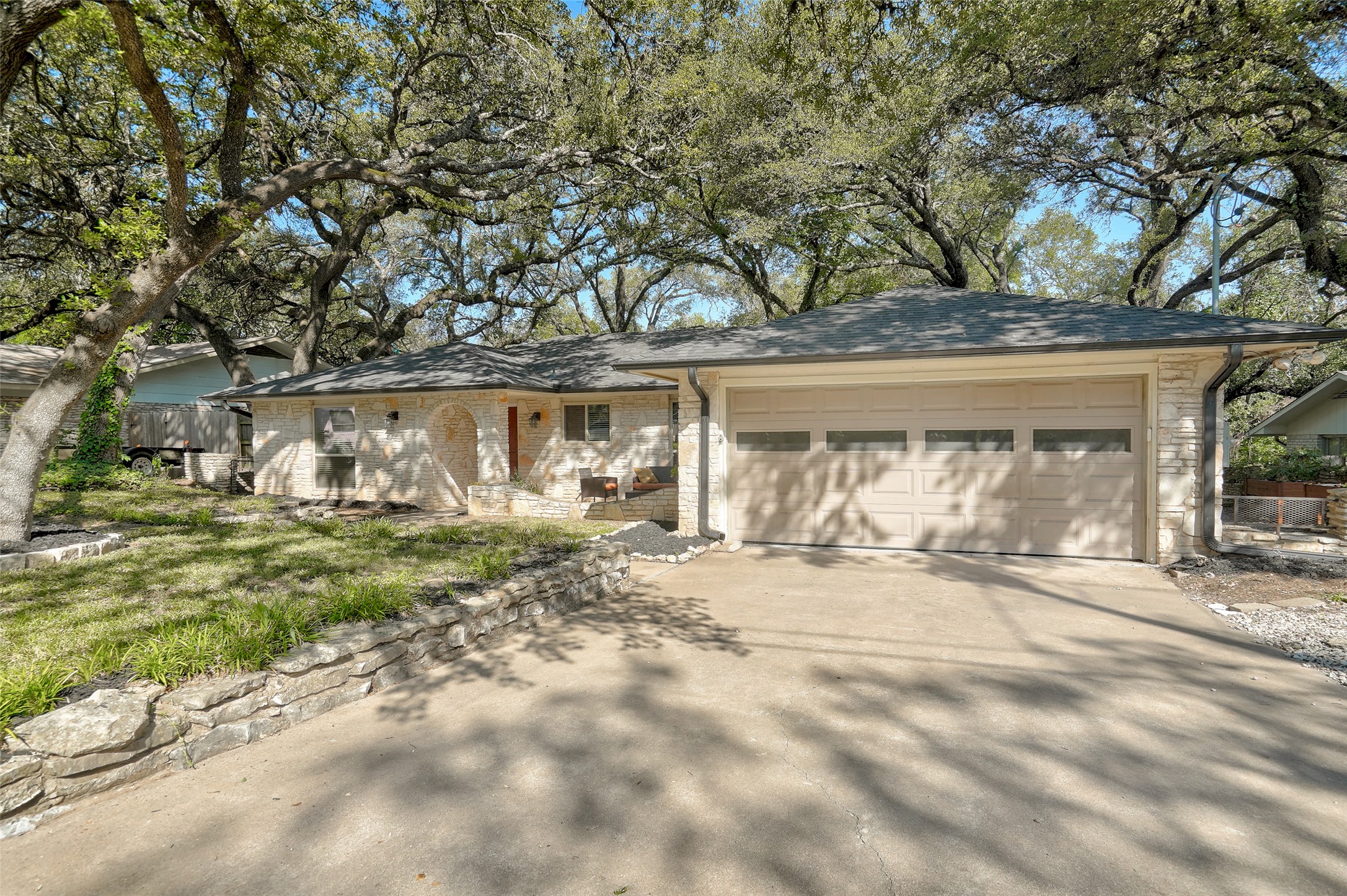 1105 North Riviera Circle Cedar Park, TX 78613 - Photo 2 of 32 a view of a house with a yard and garage