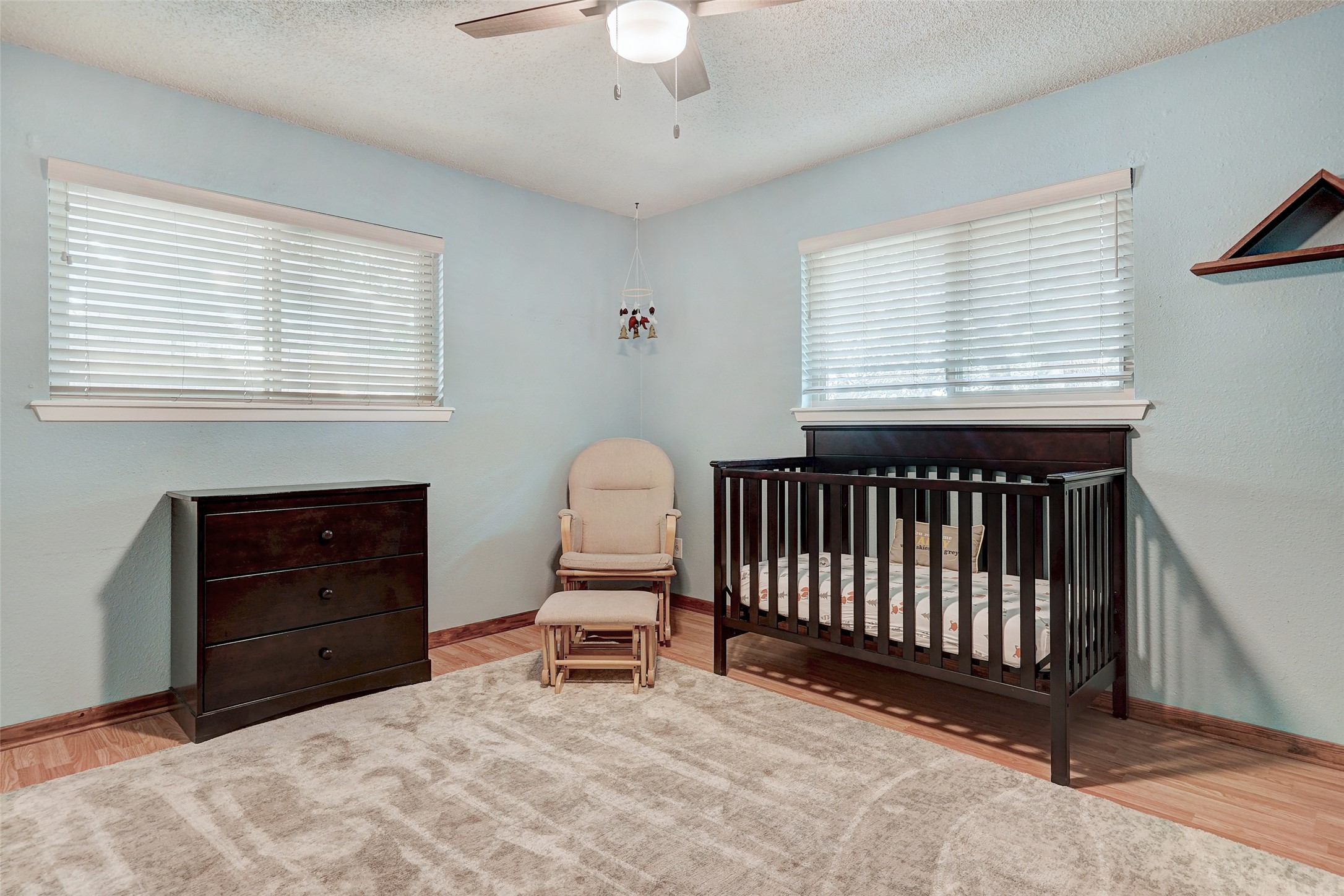 1105 North Riviera Circle Cedar Park, TX 78613 - Photo 25 of 32 a bedroom with a bed and a window