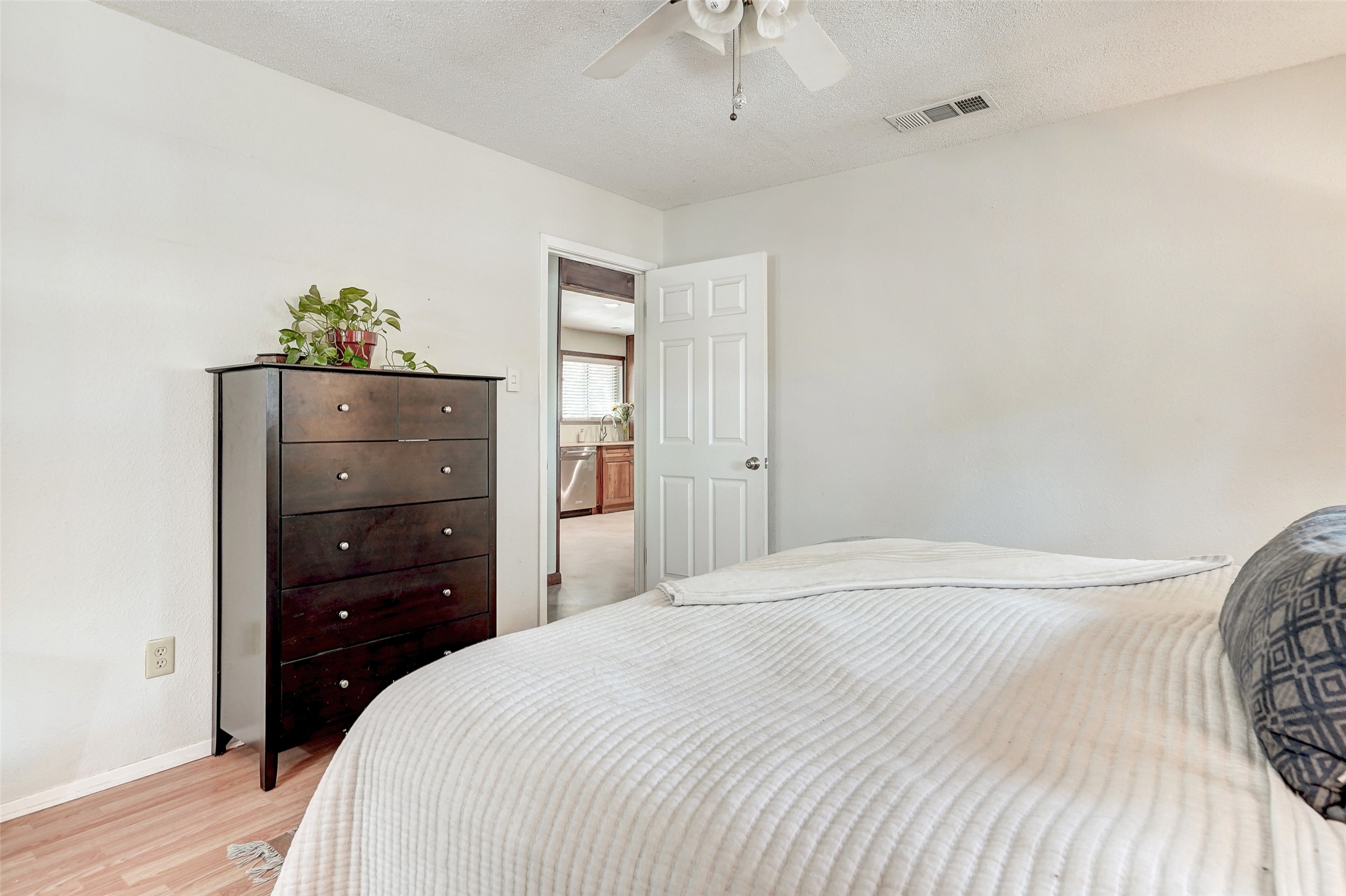 1105 North Riviera Circle Cedar Park, TX 78613 - Photo 27 of 32 a bedroom with a bed and a dresser