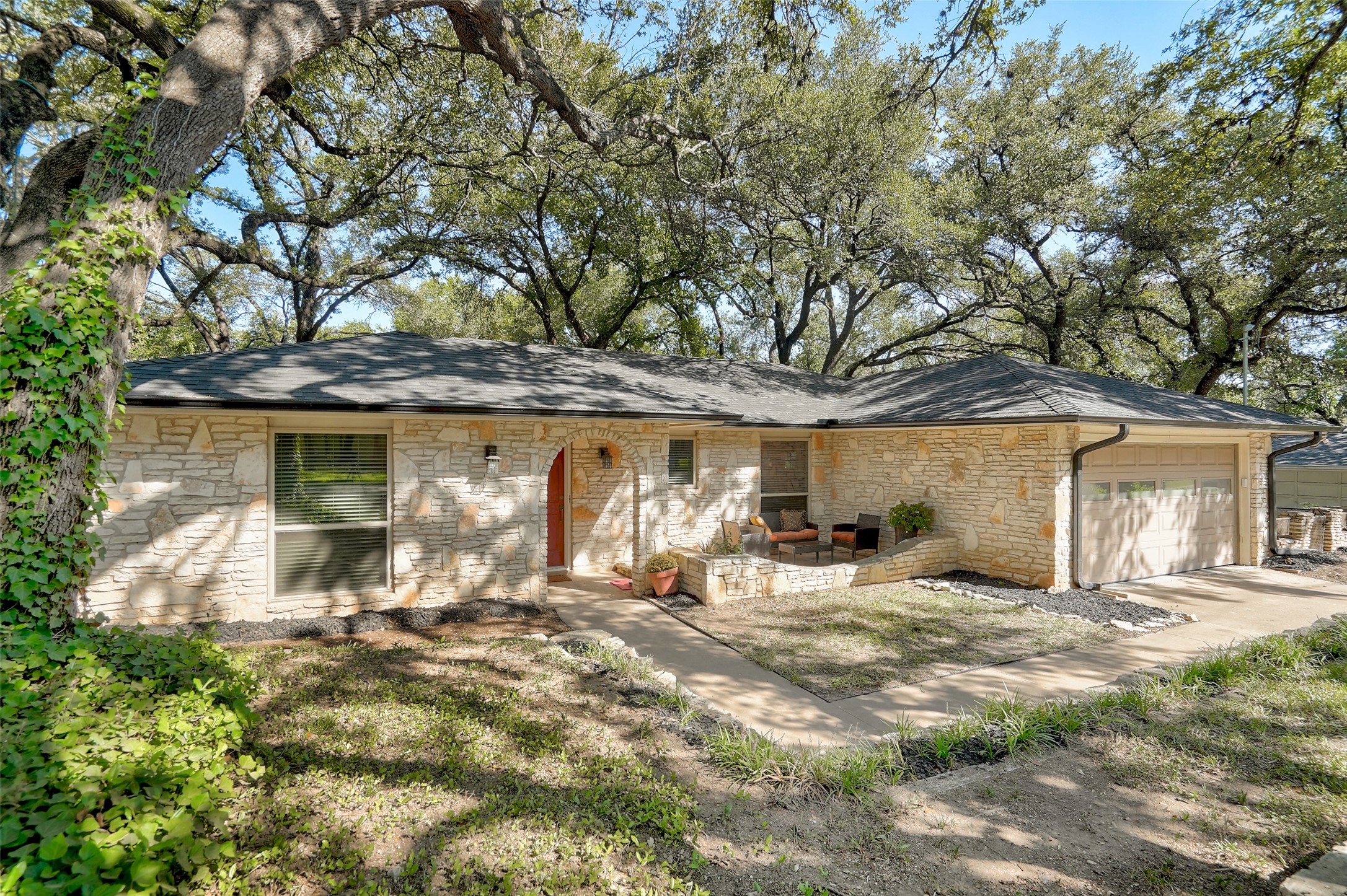 1105 North Riviera Circle Cedar Park, TX 78613 - Photo 3 of 32 a front view of house with yard and trees in the background