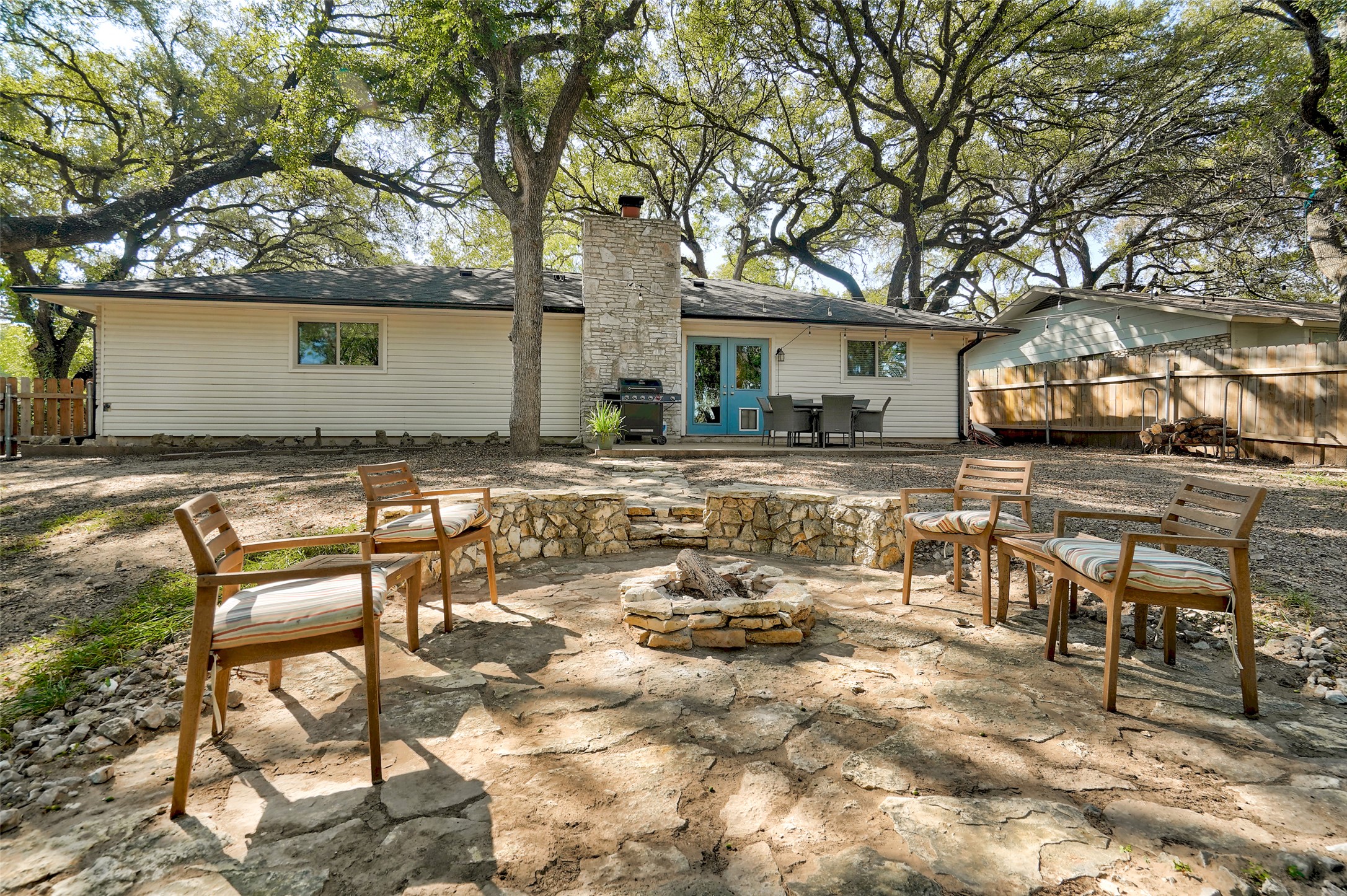 1105 North Riviera Circle Cedar Park, TX 78613 - Photo 30 of 32 a view of a yard with table and chairs