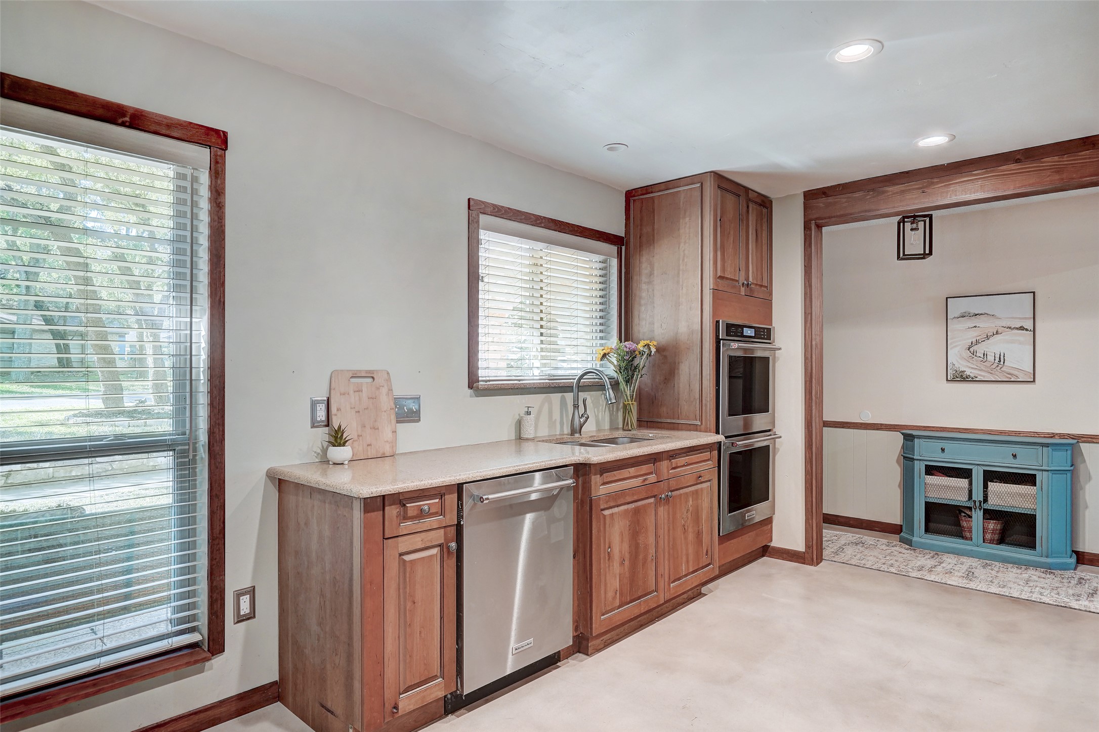 1105 North Riviera Circle Cedar Park, TX 78613 - Photo 8 of 32 a kitchen with stainless steel appliances granite countertop a stove a sink and a refrigerator