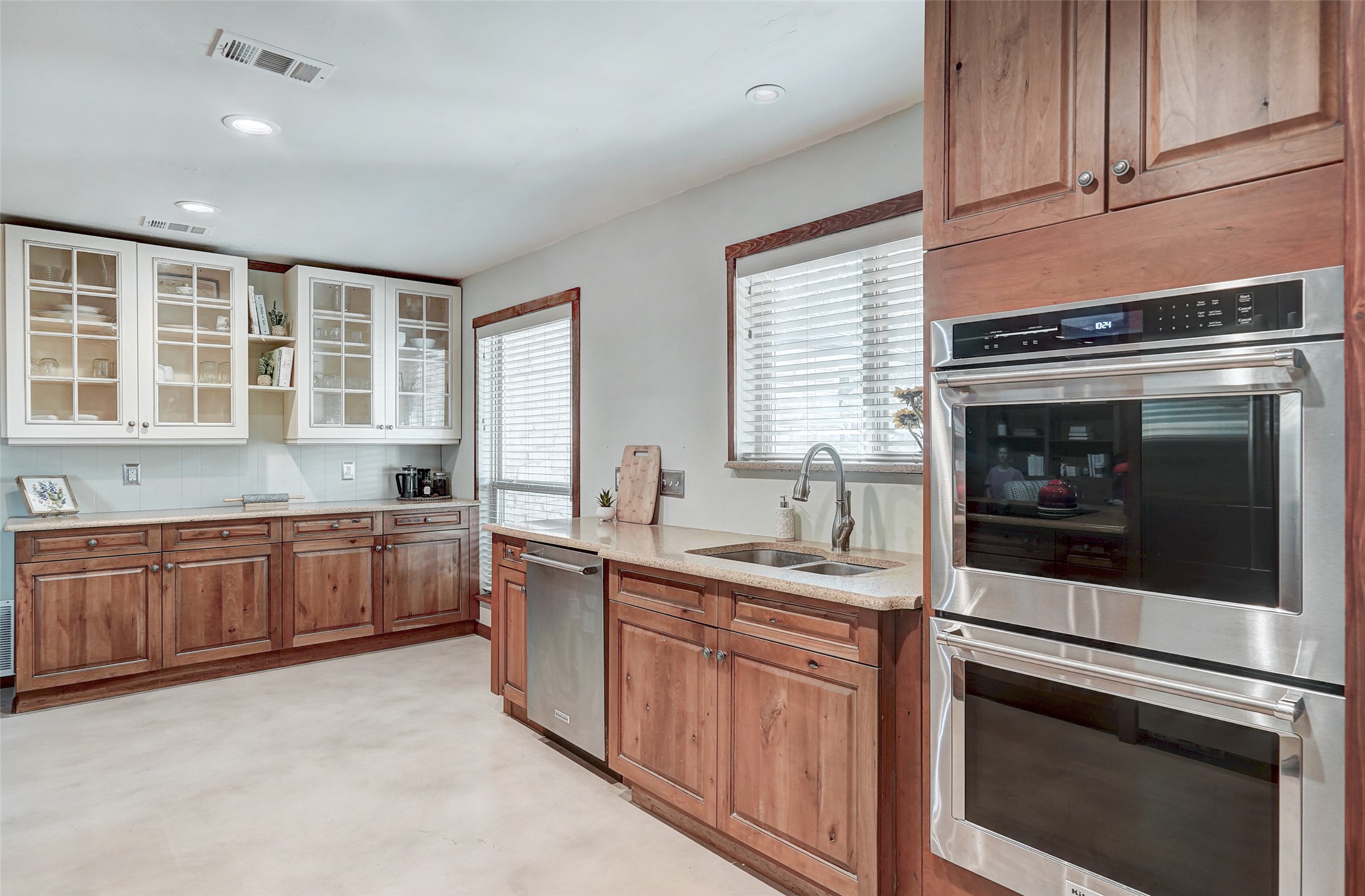 1105 North Riviera Circle Cedar Park, TX 78613 - Photo 9 of 32 a kitchen with stainless steel appliances granite countertop a stove a sink and a microwave